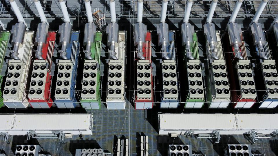 <p>These ‘chillers’ on the roof of a data center in Germany, seen from above, work to cool the equipment inside the building. <a href="https://newsroom.ap.org/detail/GermanyDataCenter/ff354b47c6a34682b8a76f9ca89613ed/photo">AP Photo/Michael Probst</a></p> These ‘chillers’ on the roof of a data center in Germany, seen from above, work to cool the equipment inside the building.